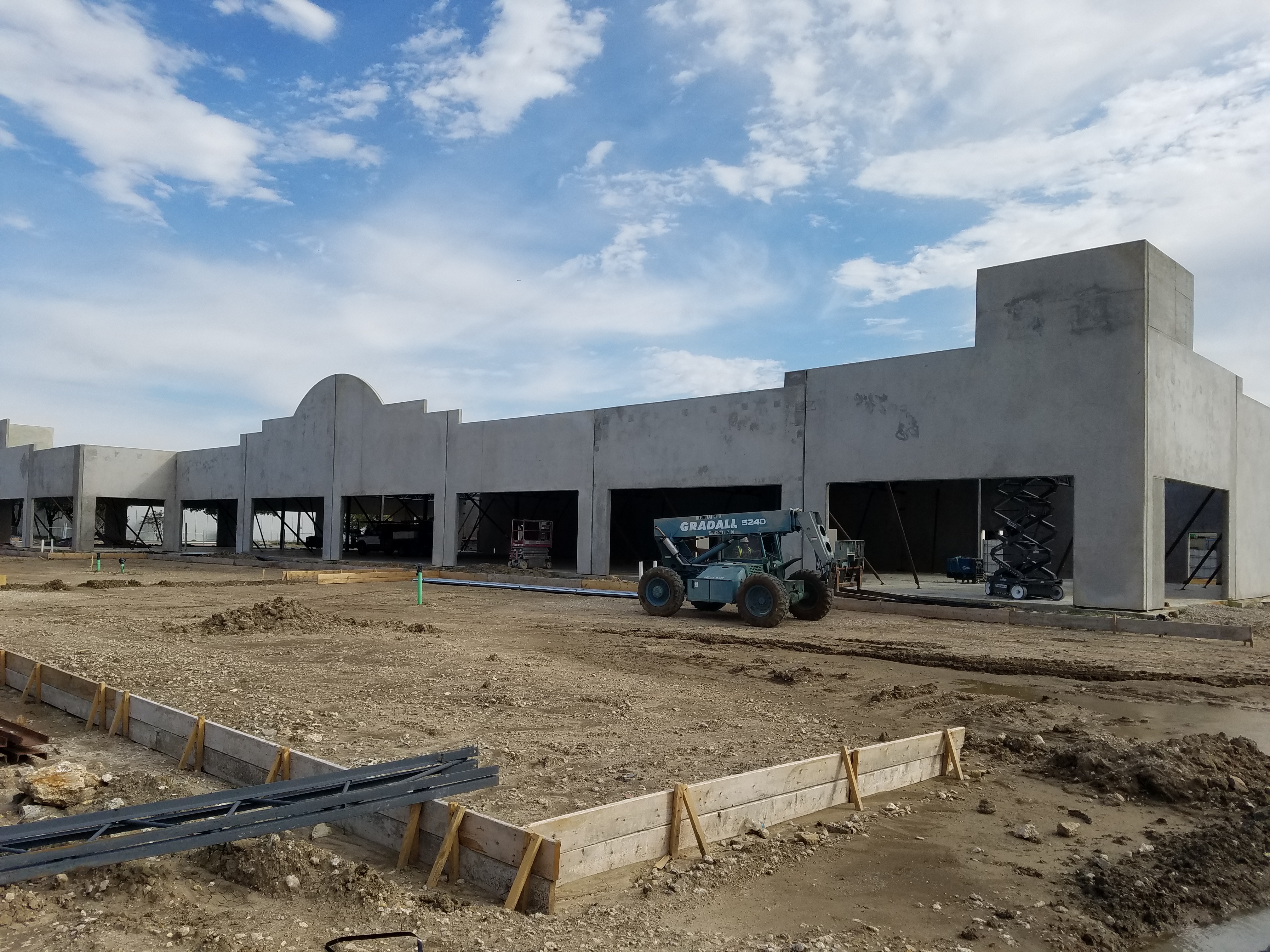 Retail center masonry facade under construction