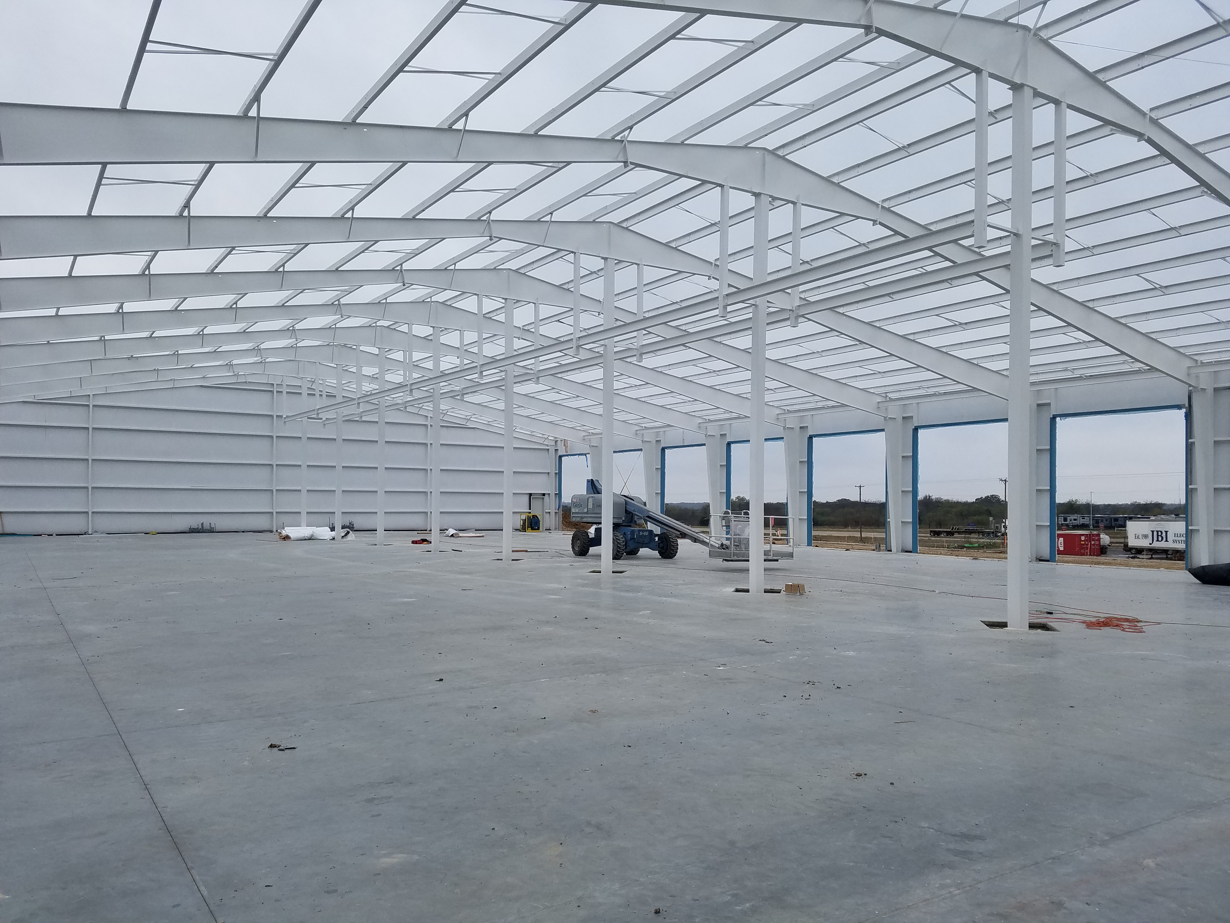 Interior of RV facility with steel roof framing in Alvarado, Texas